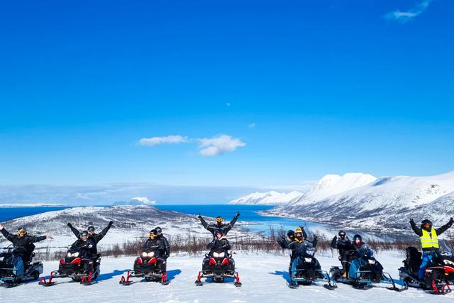 From Tromsø: Lyngen Alps Guided Snowmobile Tour with Lunch